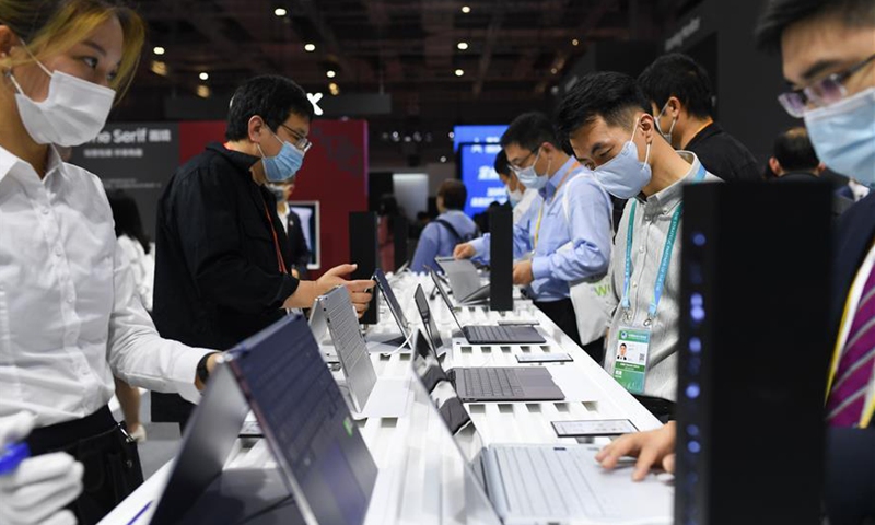 Visitors gather at the booth of Samsung at the Consumer Goods exhibition area during the third China International Import Expo (CIIE) in Shanghai, east China, Nov 7, 2020. A significant number of companies participate for three consecutive years in the CIIE.Photo:Xinhua