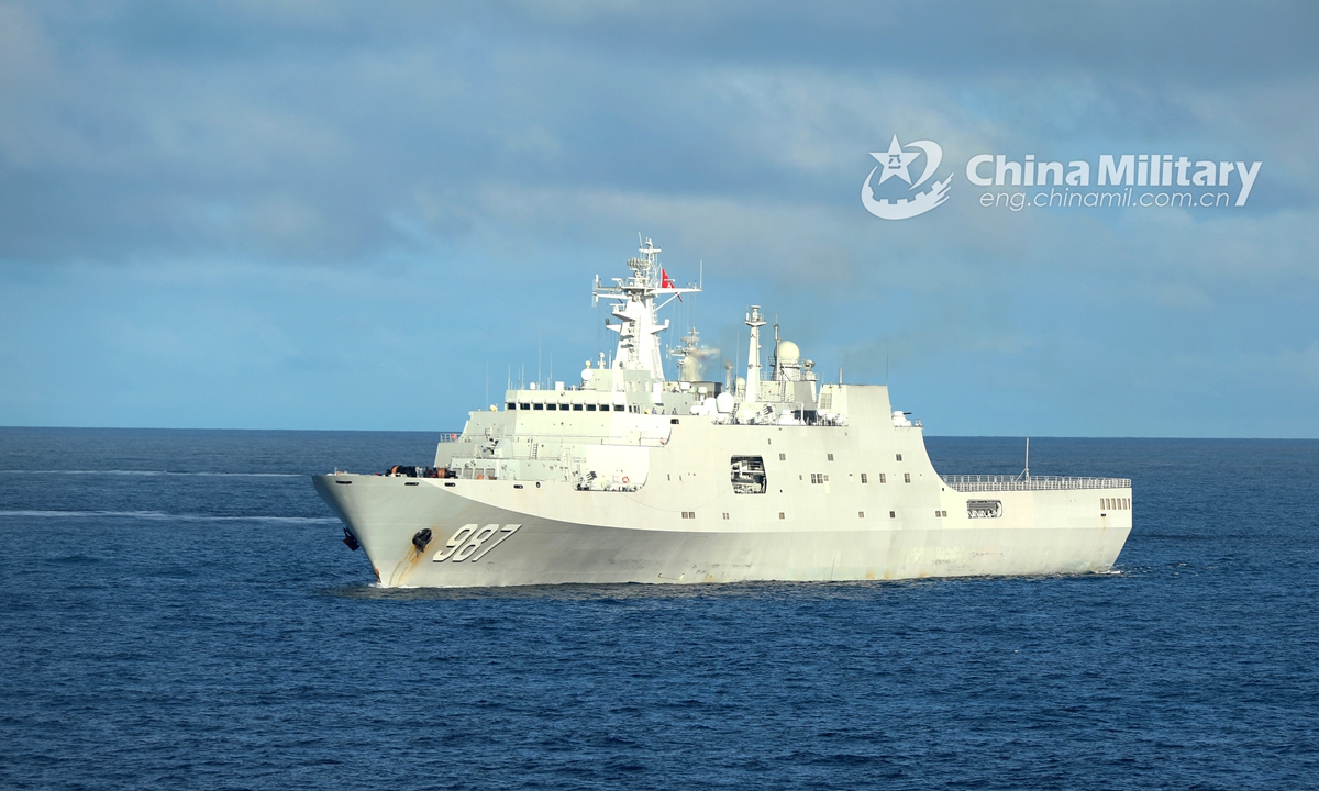 The amphibious dock landing ship Wuzhishan (Hull 987) attached to a landing ship flotilla with the navy under the PLA Southern Theater Command performs tactical maneuver in waters of the South China Sea during a maritime training exercise on November 18, 2020. The exercise lasted four days, focusing on 10 subjects including comprehensive defense, Landing Craft Air Cushion's (LCAC) transfer, visit, board, search and seizure (VBSS) operation, and live-fire operations. (eng.chinamil.com.cn/Photo by Liu Jian)
