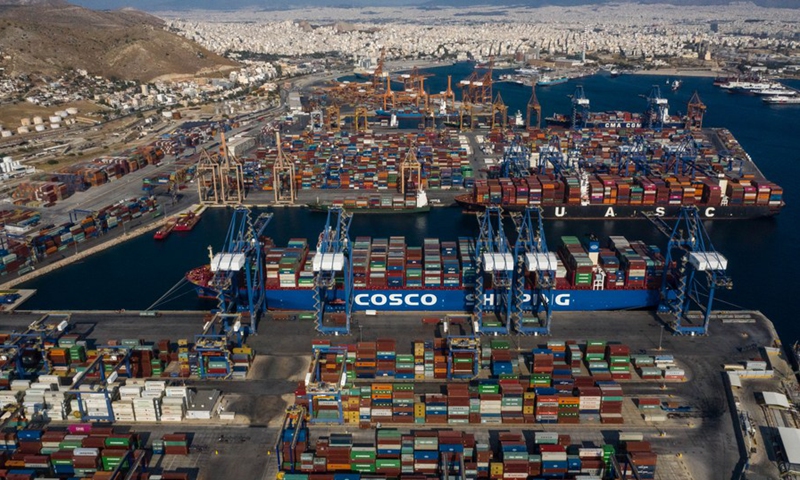 Aerial photo taken on Sept. 6, 2019 shows a cargo ship of COSCO SHIPPING Lines transporting Italian products for the 2019 China International Import Expo (CIIE) to Shanghai berths at the Port of Piraeus, Greece. (Photo by Lefteris Partsalis/Xinhua)