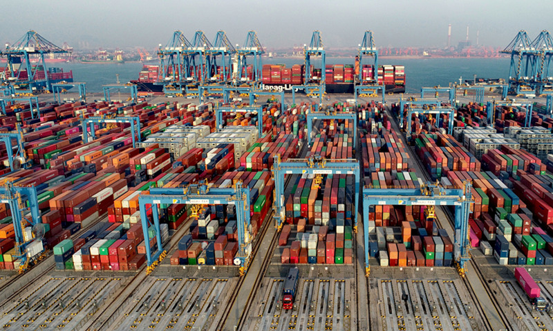 A fully automated wharf at the Qingdao Port in the Free Trade Zone (FTZ) in East China's Shandong Province is bustling. The FTZ, open for one year, focuses on the development of modern trade, logistics, finance and advanced manufacturing. Over the past year, more than 5,000 enterprises have been established there, with investment of more than 60 billion yuan ($9.13 billion). Photo: cnsphoto