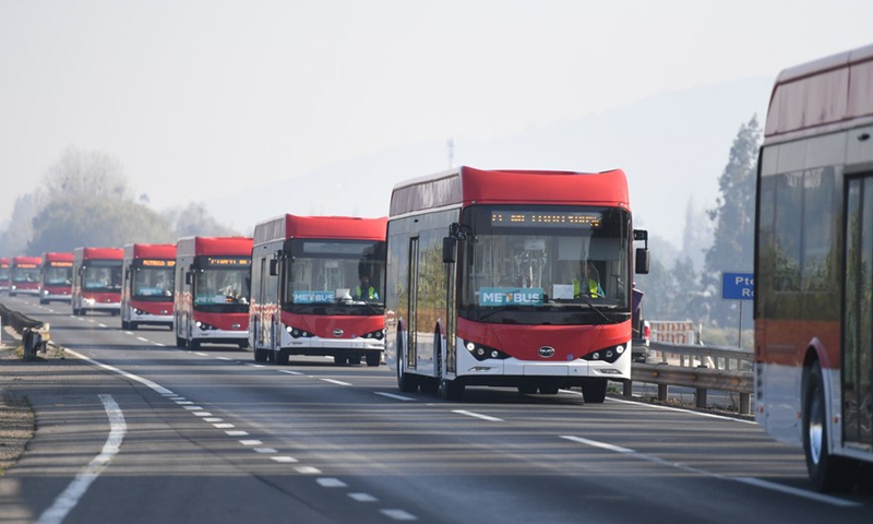 Photo taken on June 6, 2020 shows the electric buses manufactured by Chinese company BYD heading for Santiago from the Port San Antonio in Chile. (BYD Company Limited/Handout via Xinhua)