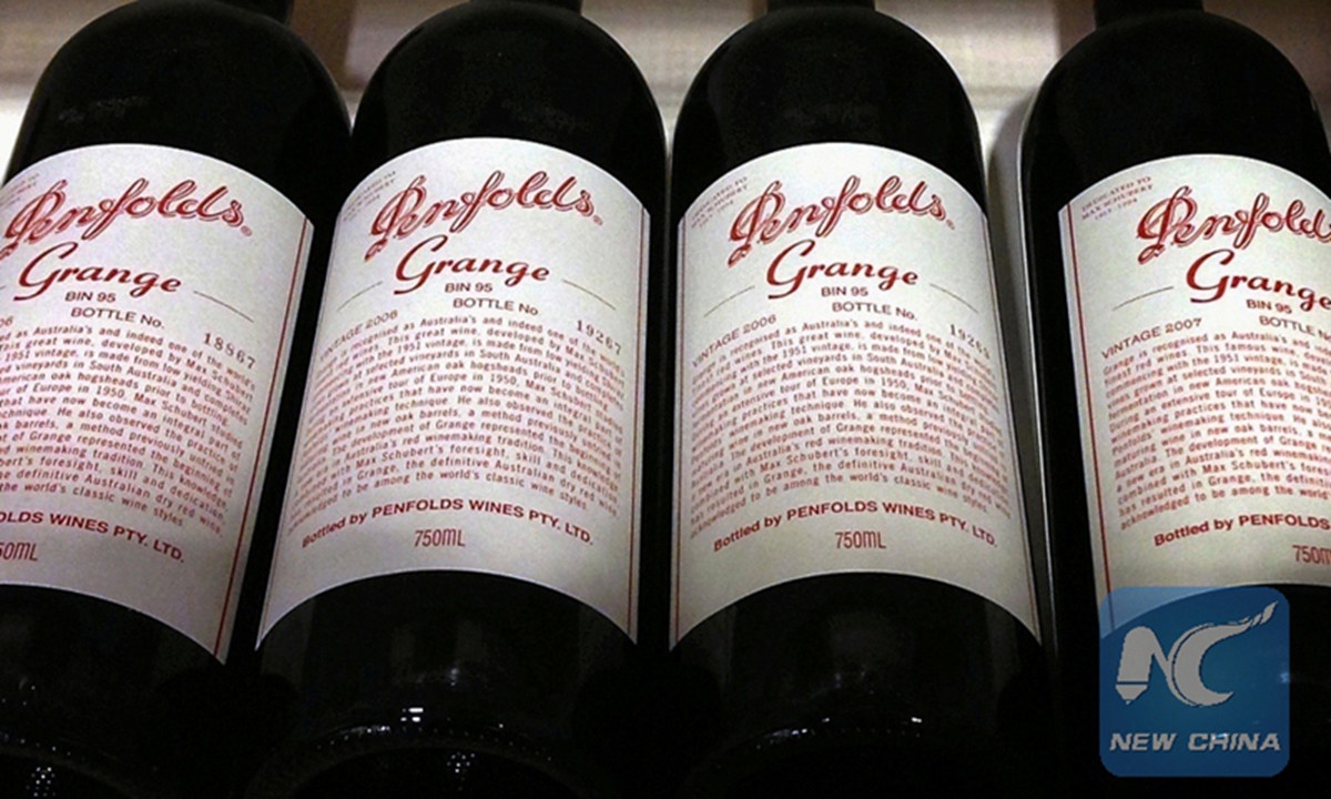 Bottles of Penfolds Grange, made by Australian wine maker Penfolds and owned by Australia's Treasury Wine Estates, sit on a shelf for sale at a wine shop in central Sydney, Australia, August 4, 2014. Photo: Xinhua/REUTERS

