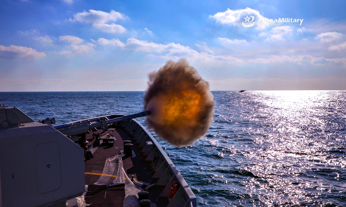 The guided-missile frigate Zhangjiakou (Hull 605) attached to a frigate flotilla with the navy under the PLA Northern Theater Command fires its main-gun against mock sea targets during a maritime training exercise in waters of the Yellow Sea in mid December, 2020. (eng.chinamil.com.cn/Photo by Wang Guangjie)