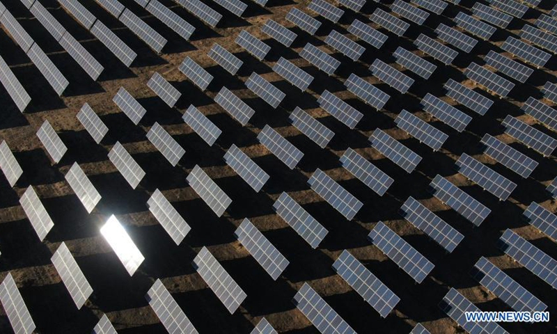 Aerial photo taken on Dec. 15, 2020 shows a view of a photovoltaic industrial park in Gonghe County, Tibetan Autonomous Prefecture of Hainan in northwest China's Qinghai Province. Qinghai authorities have been promoting clean energy in recent years. By early December this year, the province's power generation from clean energy reached 79 billion kWh, according to State Grid Qinghai Electric Power Company. (Xinhua/Zhang Hongxiang) 