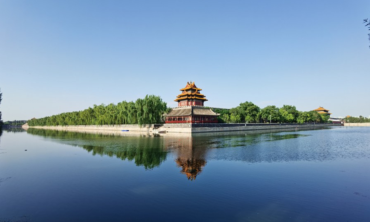 Photo taken with a mobile phone shows a turret of the Palace Museum in Beijing, capital of China, Aug. 2, 2020. (Xinhua/Xing Guangli)