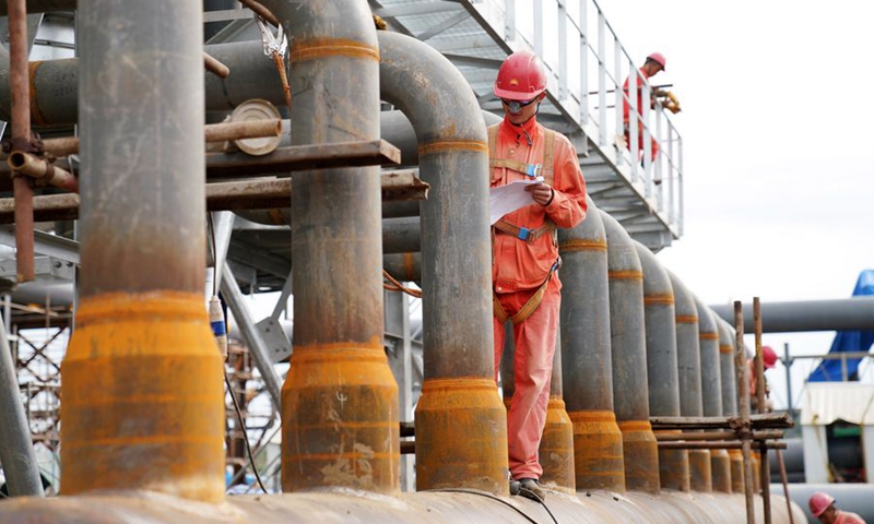 Workers are seen at the construction site of a station of the China-Russia east route natural gas pipeline project in Heihe, northeast China's Heilongjiang Province, Aug. 20, 2019. (Xinhua/Wang Jianwei) 