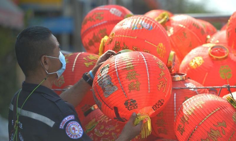 Chinese lanterns zodiac sign which year china Staff members arrange lanterns to decorate street for upcoming Chinese
