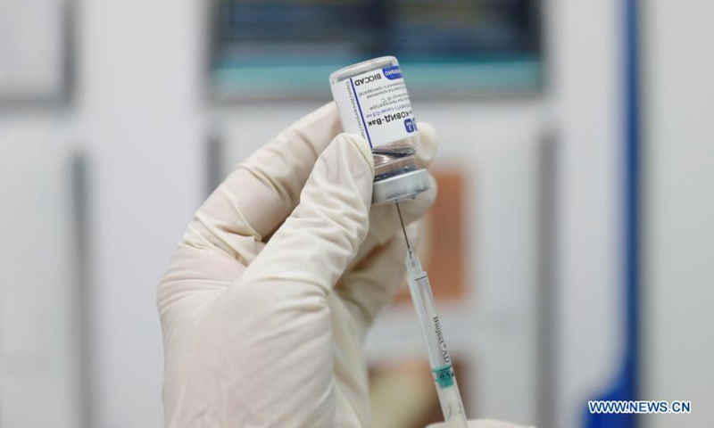 A healthcare worker prepares to give injection of Sputnik V vaccine at a local hospital in Nur-Sultan, Kazakhstan, on Feb. 1, 2021. Kazakhstan began its coronavirus vaccination campaign Monday using Russian-made Sputnik V. According to the ministry, the vaccination, carried out on a voluntary and free basis, will continue until the end of 2021 and will cover up to 6 million people. (Photo by Kalizhan Ospanov/Xinhua)