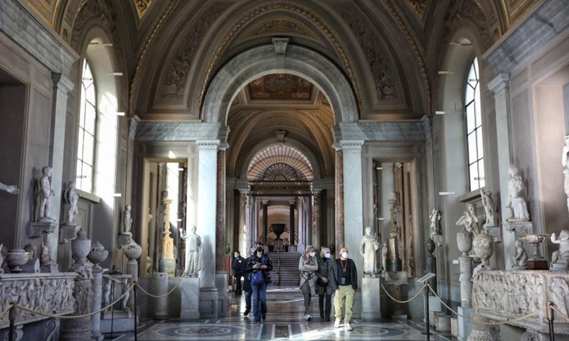 People wearing face masks visit the Vatican Museums, on Feb. 5, 2021. The Vatican Museums, previously closed due to the COVID-19 outbreak, reopened as of Feb. 1, while visitors are required to make appointments on-line before arrival. (Xinhua/Cheng Tingting) 
