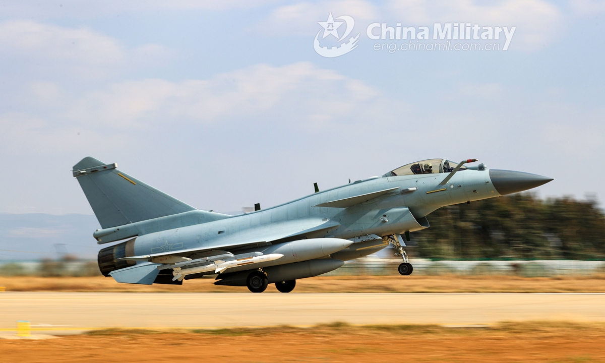 A J-10 fighter jet attached to an aviation brigade of the air force under the PLA Southern Theater Command takes off from the runway during a day-into-night flight training exercise on February 2, 2021. The exercise is focused on training items like tactical formation flight, simulated aerial combat, etc.Photo:China Military