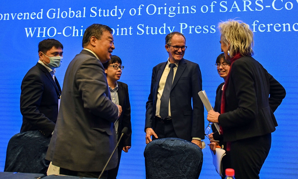 Peter Ben Embarek (center) talks with Liang Wannian (left) and Marion Koopmans (right) after a press conference to wrap up a visit by an international team of experts from the World Health Organization (WHO) in the city of Wuhan, in Central China's Hubei Province on Tuesday. Photo: AFP