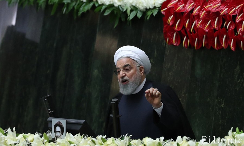 Iranian President Hassan Rouhani addresses the opening session of Iran's new parliament in Tehran, Iran, May 27, 2020. (Photo by Ahmad Halabisaz/Xinhua)