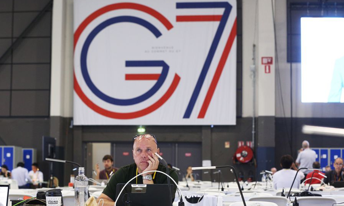 Journalists work at the G7 summit press center in Biarritz, France, Aug. 25, 2019. Leaders from the world's seven most industrialized countries started the divided group's 45th summit, clouded by a pile of tough issues with trade tensions high on agenda, on Saturday evening at the French seaside resort Biarritz. (Xinhua/Gao Jing)