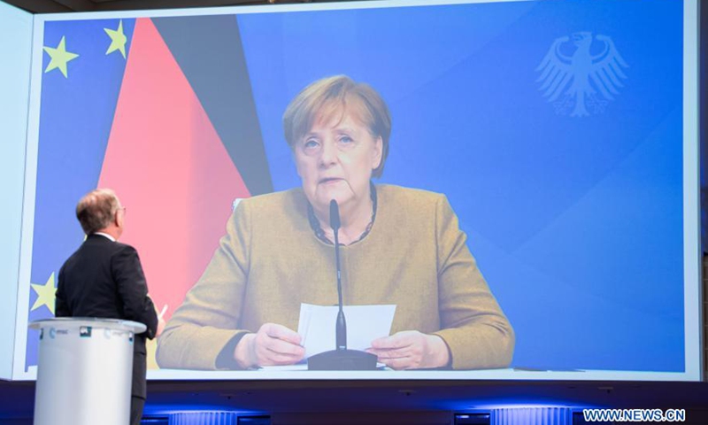 Photo taken in Munich, Germany, on Feb. 19, 2021 shows German Chancellor Angela Merkel (on the screen) addressing the virtual Munich Security Conference. Merkel told the special virtual edition of the Munich Security Conference on Friday that multilateralism provided the basis for all political activities and that multilateral organizations should be strengthened.Photo:Xinhua