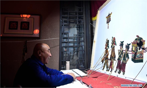 Shadow puppet show held ahead of upcoming Chinese lantern festival in ...