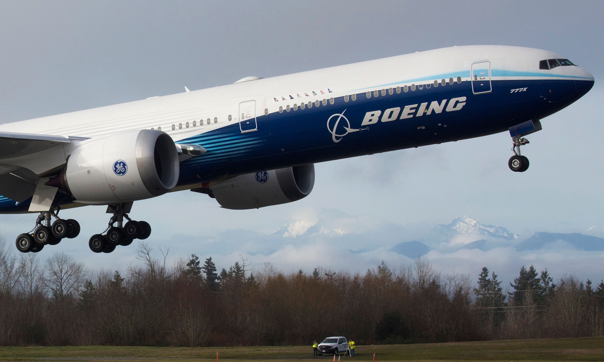 A Boeing 777X aircraft takes off on its inaugural flight from Paine Field at Everett, Washington State, the US on January 25, 2020. Photo: VCG