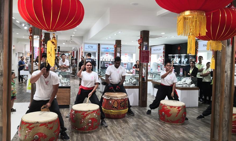 People perform to celebrate the upcoming Chinese Lantern Festival at a chain store of Jack's of Fiji in Suva, Fiji, Feb. 25, 2021. (Xinhua/Zhang Yongxing) 