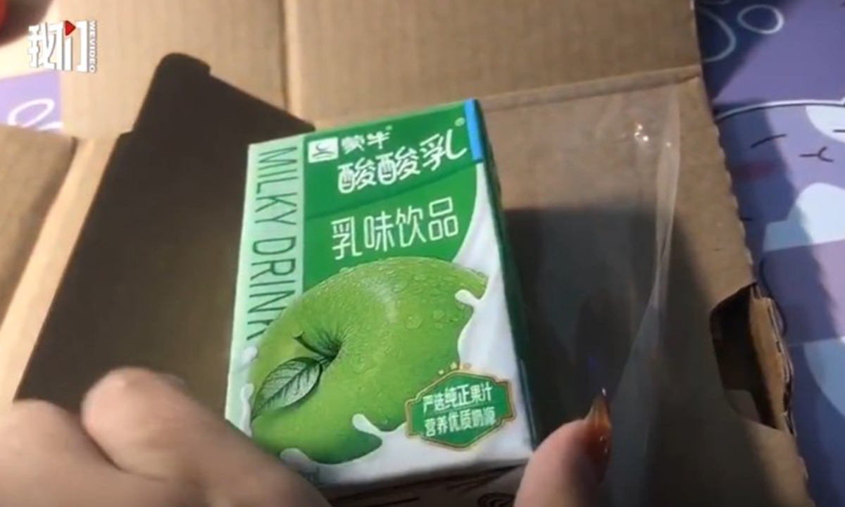 Liu only received a box of yogurt after buying an iPhone online. (photo: screenshot of We Video)