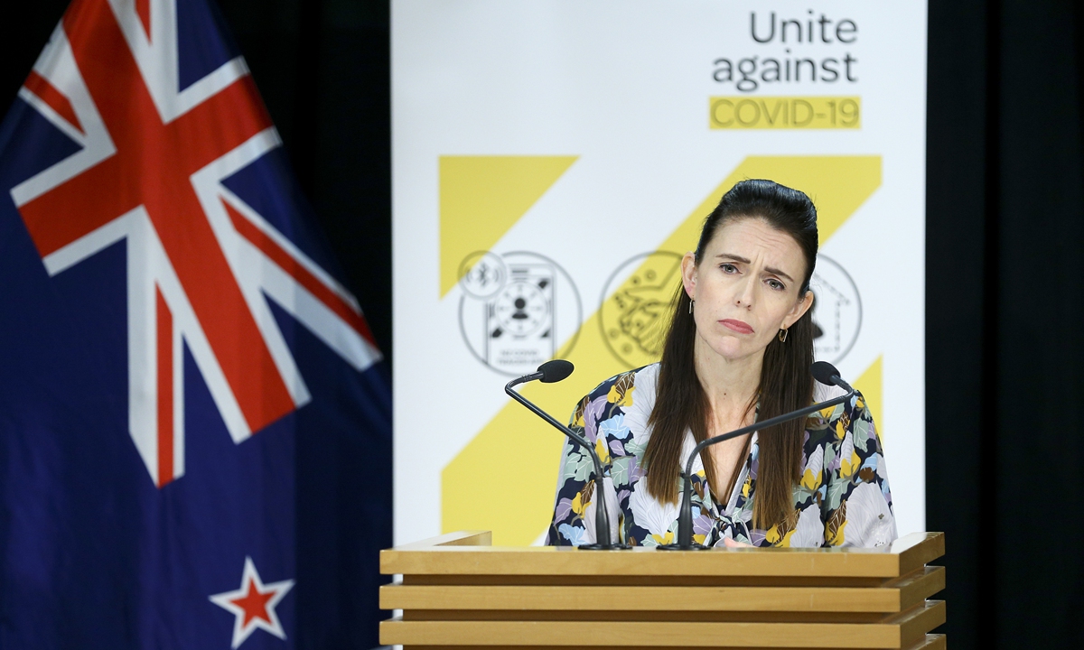 Jacinda Ardern, New Zealand's Prime Minister, looks on during a press conference at Parliament on Sunday in Wellington, New Zealand. Auckland has entered Level 3 lockdown for the next seven days after a new COVID-19 case was detected in the community on Saturday. The rest of New Zealand will be subject to Level 2 restrictions for a week. Photo: VCG