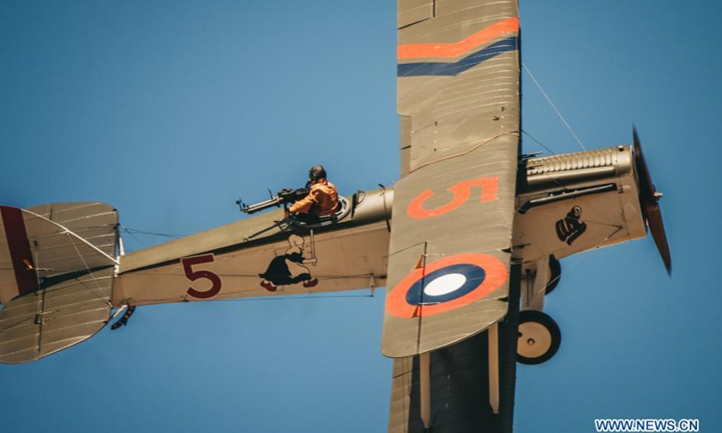 A pilot performs during the Wings Over Wairarapa airshow at the Hood Aerodrome in Masterton, New Zealand, Feb. 27, 2021. Over 15,000 people gathered and crowded on the side of the airstrip of Hood Aerodrome in Masterton, New Zealand on Saturday, to watch the biennial Wings Over Wairarapa airshow. (Photo: Xinhua)