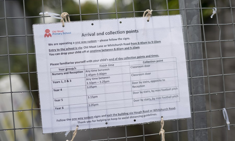 Photo taken on Sept. 8, 2020 shows a sign outside Old Moat Primary School in Greater Manchester, Britain.(Photo: Xinhua)