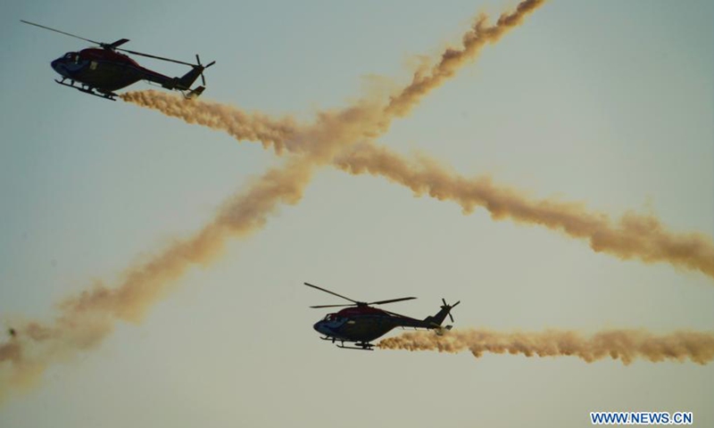 Military helicopters perform during the rehearsal of an air show in Colombo, Sri Lanka, on Feb. 28, 2021.(Photo: Xinhua)
