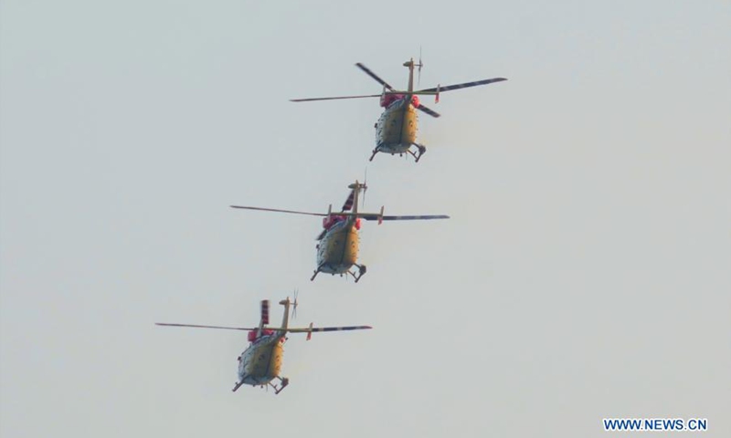 Military helicopters perform during the rehearsal of an air show in Colombo, Sri Lanka, on Feb. 28, 2021.(Photo: Xinhua)