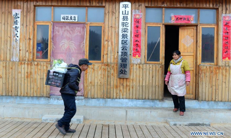 Located at the junction of north China's Shanxi and Hebei provinces, the living and working conditions of the reserve are quite harsh. On winter days, the roads up to the mountainous area are mostly frozen. Rong has to carry daily necessities to his residence personally, which will cost about 5-6 hours to make a round trip. Normally, Rong patrols twice a day but will increase the number when encountering extreme weather that might trigger wildfires.Photo:Xinhua