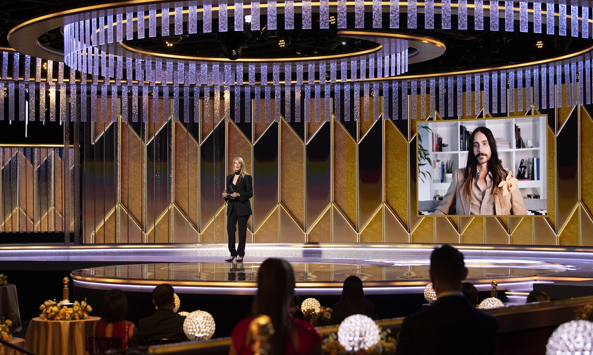 Laura Dern presents the award for Best Performance by an Actor in a Supporting Role in any Motion Picture during the 78th annual Golden Globe Awards ceremony on Sunday. Photo: IC