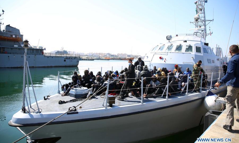 Illegal immigrants are seen on the deck of the Libyan Coast Guard's ship in Tripoli, Libya, on Feb. 28, 2021. A total of 181 illegal immigrants were rescued on Sunday by the Libyan Coast Guard off the country's western coast.(Photo: Xinhua)