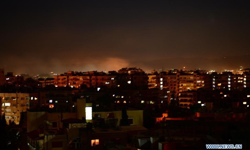 Smoke rises following an Israeli missile attack in Damascus, Syria, on Feb. 28, 2021. A fresh Israeli missile attack targeted positions in the vicinity of Damascus on Sunday night, state TV reported.(Photo: Xinhua)