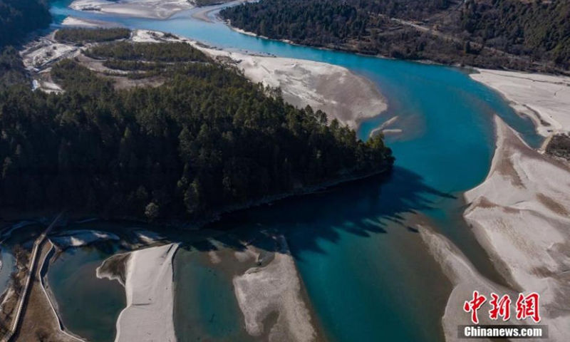 Photo shows the landscape of spruce forest in Bomi country of Nyingchi, southwest China's Tibet Autonomous Region. With an area of 4,600 hectares, the forest covers 61 percent of the area. It was listed as a coniferous nature reserve in 1984. (Photo: ecns.cn)