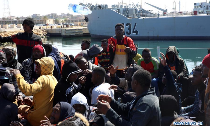 Illegal immigrants are seen on the deck of the Libyan Coast Guard's ship in Tripoli, Libya, on Feb. 28, 2021. A total of 181 illegal immigrants were rescued on Sunday by the Libyan Coast Guard off the country's western coast.(Photo: Xinhua)