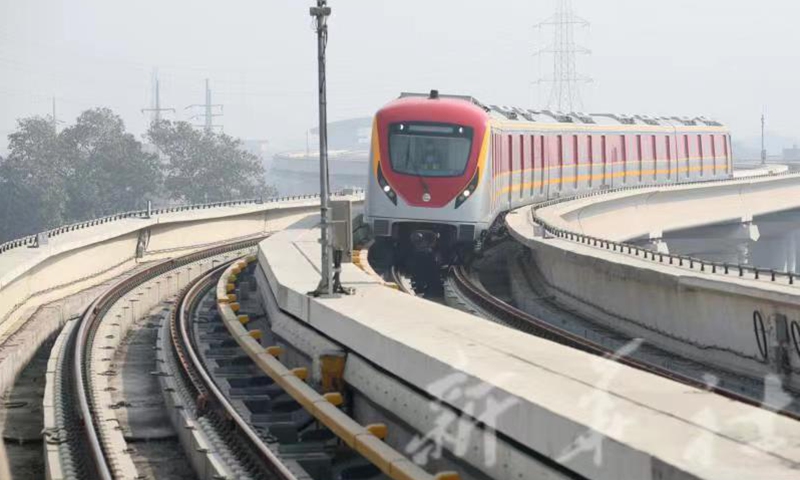 Photo taken on October 24, 2020 shows an Orange Line metro train pilot test run in Pakistan's eastern city of Lahore. The Orange Line Metro Train project is one of the CPEC early-harvest projects. Photo: Xinhua