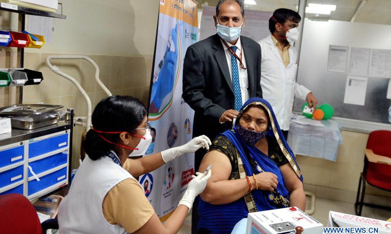 A woman receives a dose of COVID-19 vaccine at a government hospital in New Delhi, India on March 1, 2021. The phase 2 of the ongoing COVID-19 vaccine drive began in the country on Monday. The phase 2 of the vaccination drive would inoculate those above the age of 60 and those over 45 with comorbidities.(Photo: Xinhua)