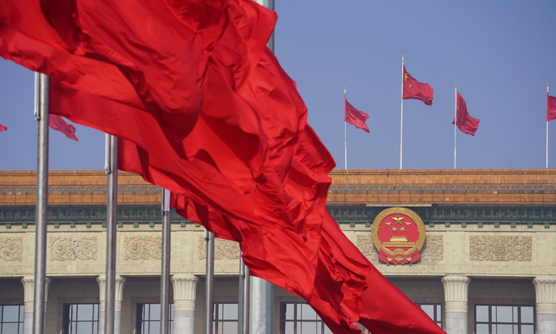 Photo taken on May 22, 2020 shows flags on the Tian'anmen Square and atop the Great Hall of the People in Beijing, capital of China.(Photo: Xinhua)