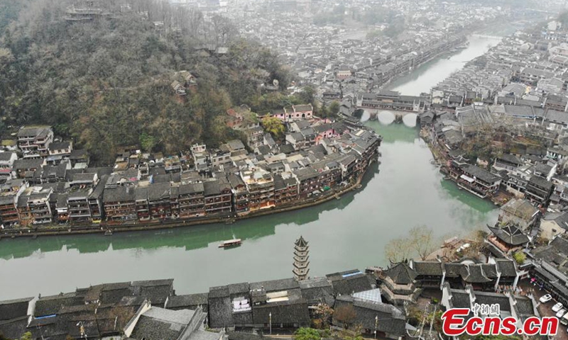 Photo taken on Feb. 16, 2021 shows the Tuojiang River in Fenghuang Town in Xiangxi Tujia and Miao autonomous prefecture, Central China's Hunan Province.Photo:China News Service