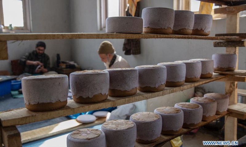 Worker make papier mache crafts at a workshop in the downtown area of Srinagar city, the summer capital of Indian-controlled Kashmir, March 1, 2021. Papier mache is an art of moulding paper and flour and later sculpting it to create different crafts. (Photo: Xinhua)