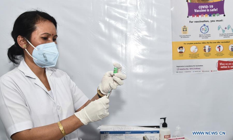 A health worker prepares a shot of COVID-19 vaccine in Gauhati, India, March 1, 2021. The phase 2 of the ongoing COVID-19 vaccine drive began in the country on Monday. The phase 2 of the vaccination drive would inoculate those above the age of 60 and those over 45 with comorbidities.(Photo: Xinhua)