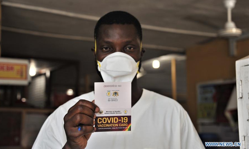 A man shows his COVID-19 vaccination card after receiving the injection at a hospital in Accra, Ghana, on March 2, 2021. The government of Ghana Tuesday rolled out a program to commence the mass vaccination of people living in some 43 epicenter-districts in the Greater Accra, Ashanti and Central regions against the COVID-19 pandemic.(Photo: Xinhua)