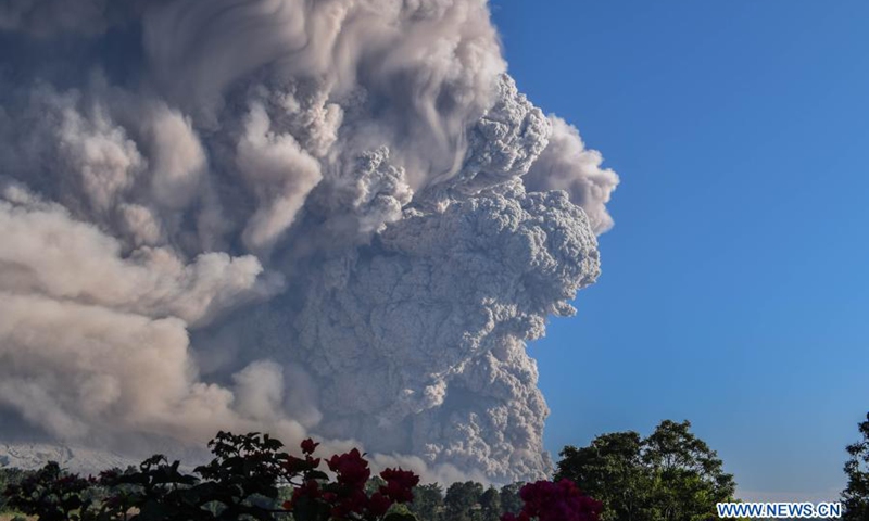 Photo taken on March 2, 2021 shows volcanic materials being spewed from Mount Sinabung in Karo, North Sumatra, Indonesia. Mount Sinabung on the Indonesian island of Sumatra erupted on Tuesday, spewing ash clouds as high as 5,000 meters into the sky. There were no reports of casualties or damages.(Photo: Xinhua)