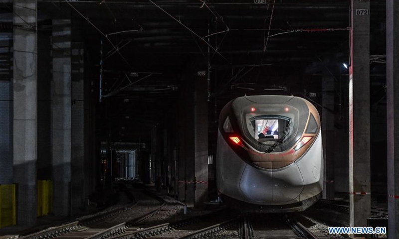 A train of the Guangzhou Metro Line 18 is under hot-running test in Guangzhou, south China's Guangdong Province, March 3, 2021. The electric train, with a maximum designed speed of 160 km per hour, carried out the first hot-running test in the small hours of Thursday morning, in order to conduct a comprehensive inspection of the subway power supply, signal, communication, line, and electromechanical system of the line.Photo:Xinhua