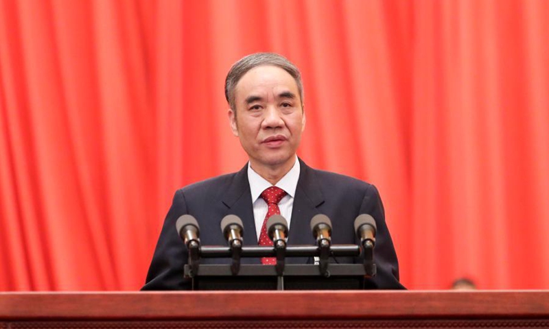 Gu Shengzu delivers a report on how the proposals from political advisors have been handled at the opening meeting of the fourth session of the 13th National Committee of the Chinese People's Political Consultative Conference (CPPCC) at the Great Hall of the People in Beijing, capital of China, March 4, 2021. (Xinhua/Yao Dawei)