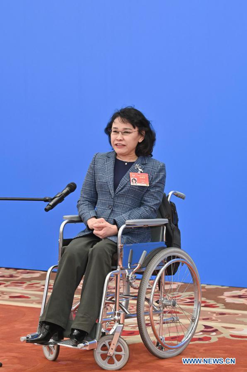 Zhang Haidi, a member of the 13th National Committee of the Chinese People's Political Consultative Conference (CPPCC), is interviewed via video link ahead of the opening of the fourth session of the 13th CPPCC National Committee at the Great Hall of the People in Beijing, capital of China, March 4, 2021. (Xinhua/Zhang Haofu)