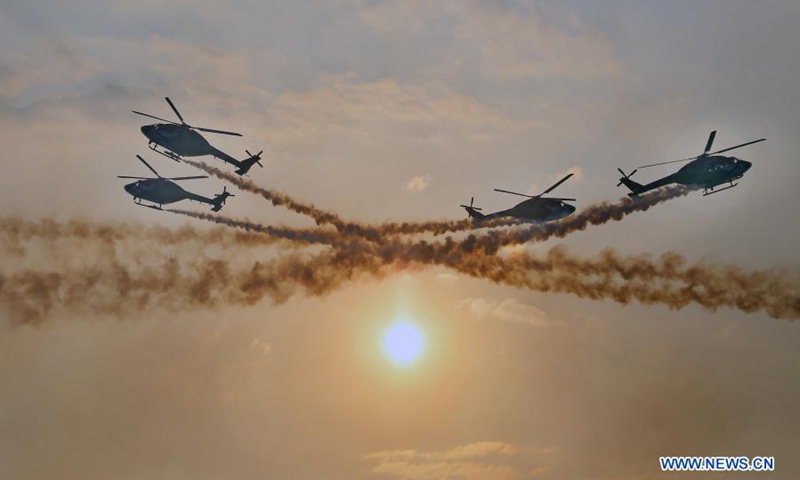 Helicopters perform during an air show to mark the 70th anniversary of the Sri Lanka Air Force in Colombo, Sri Lanka, on March 3, 2021.(Photo: Xinhua)