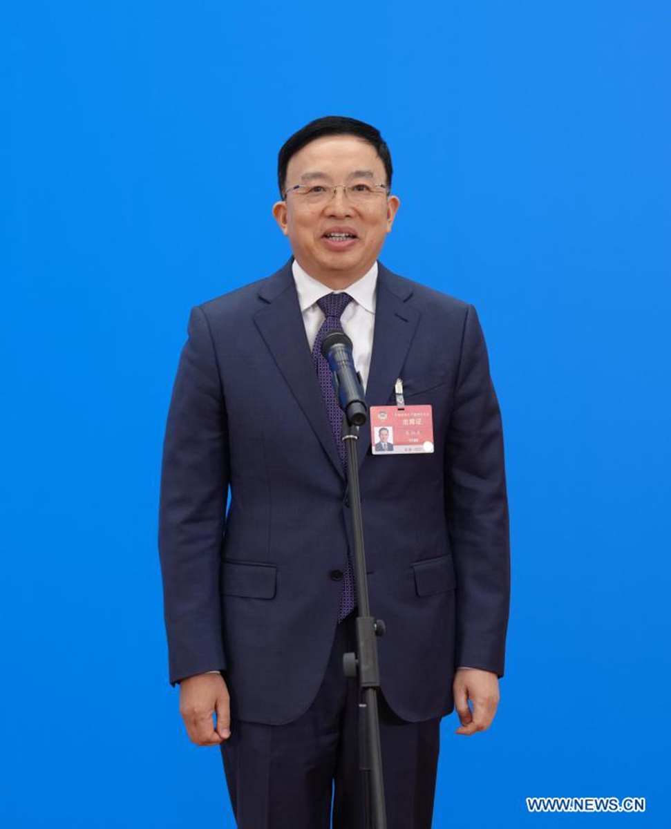 Zhu Zhengfu, a member of the 13th National Committee of the Chinese People's Political Consultative Conference (CPPCC), is interviewed via video link ahead of the opening of the fourth session of the 13th CPPCC National Committee at the Great Hall of the People in Beijing, capital of China, March 4, 2021. (Xinhua/Li He)