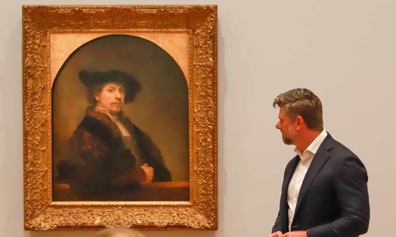 Nick Mitzevich, director of the National Gallery of Australia (NGA), introduces the paintings at the media preview of an exhibition in Canberra, Australia on March 3, 2021. An exhibition with 61 paintings from the National Gallery London spanning nearly 500 years will start on Friday. It brought together works of 56 of European history's greatest artists including Botticelli, Titian, Velazquez, Rembrandt, Vermeer, Goya, Van Dyck, Canaletto, Turner, Renoir, Cezanne, Monet and Gauguin, and will run until June 14.Photo:Xinhua