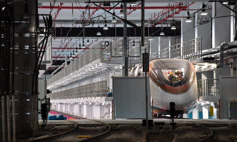 A train of the Guangzhou Metro Line 18 pulls out for a hot-running test in Guangzhou, south China's Guangdong Province, March 3, 2021.(Photo: Xinhua)