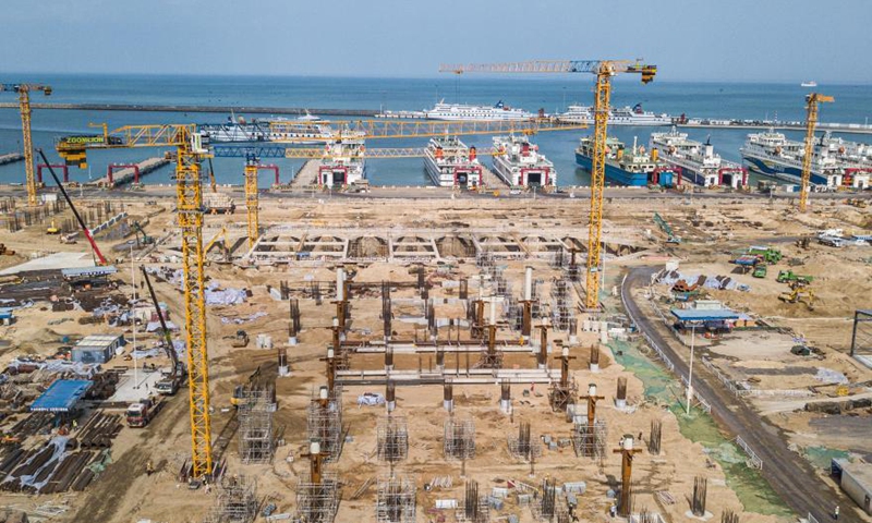 Aerial photo taken on March 5, 2021 shows the construction site of a passenger transportation station at the Xinhai Port in Haikou, south China's Hainan Province. The completion of this project will help improve the service level of the Xinhai Port in Haikou. Photo: Xinhua