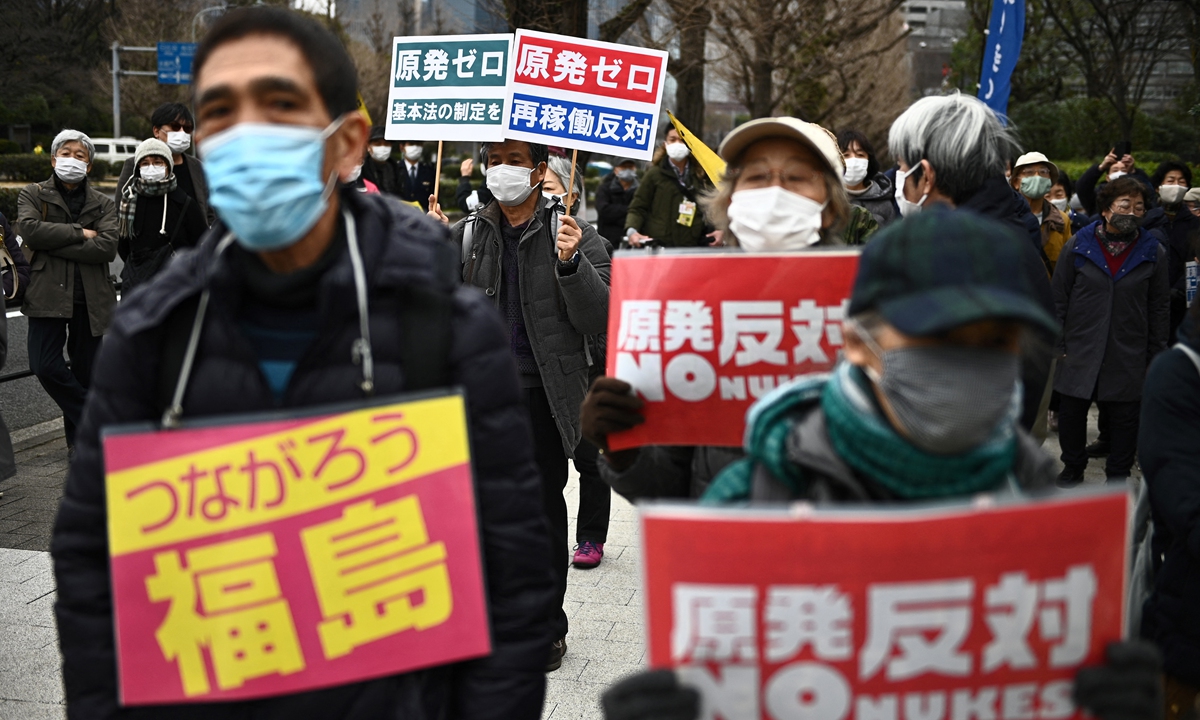 Activists take part in an anti-nuclear protest outside the Parliament building in Tokyo, Japan on Sunday, ahead of the 10th anniversary of the Fukushima nuclear disaster this March 11. Photo: AFP